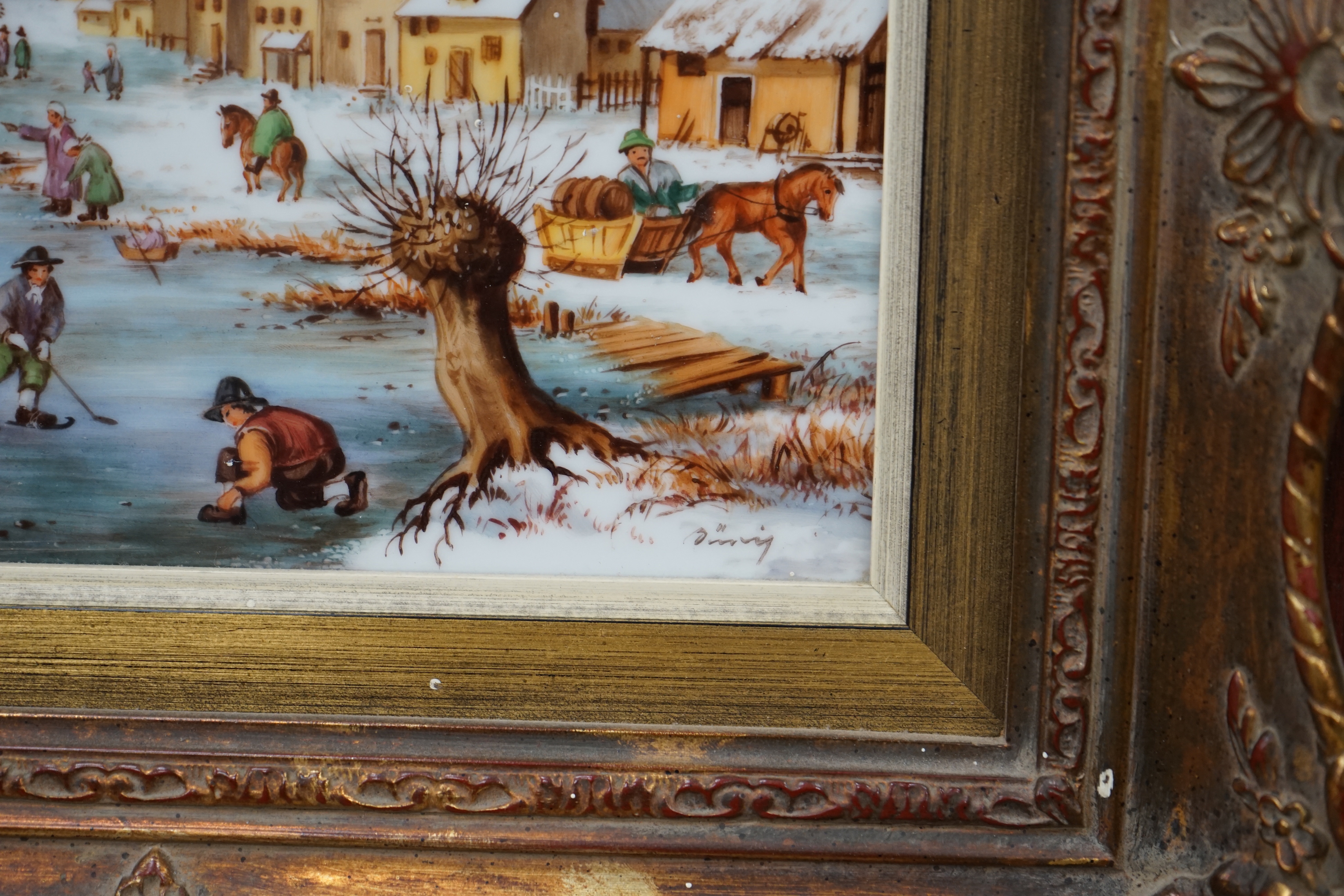 A West German porcelain plaque hand painted with a winter landscape and figures skating, indistinctly signed, 17 x 23cm